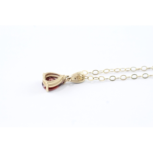 58 - 9ct gold garnet & diamond pendant necklace (1.4g)