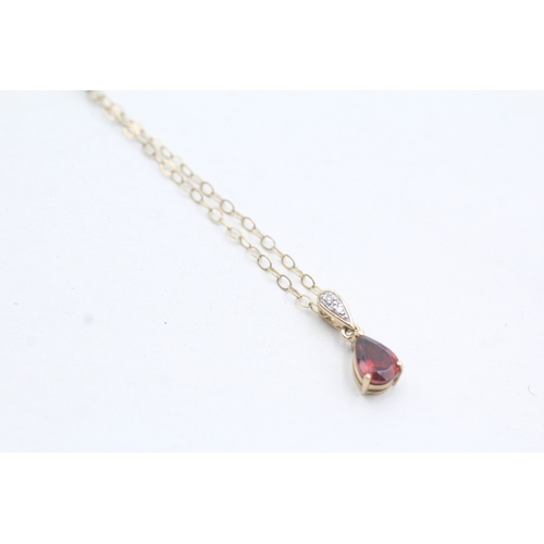 58 - 9ct gold garnet & diamond pendant necklace (1.4g)