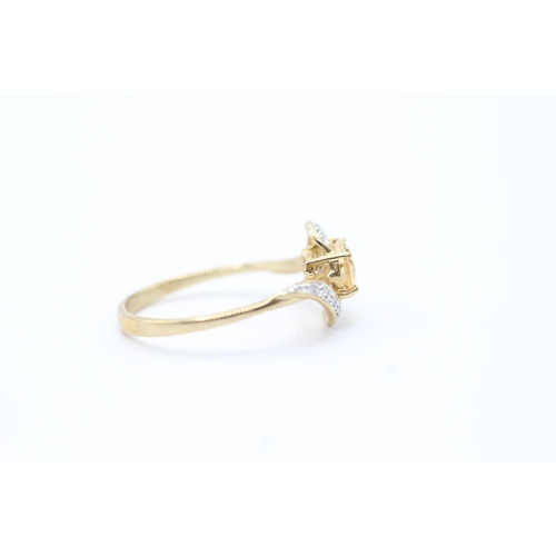 63 - 9ct gold diamond and citrine set dress ring (1.9g) Size N