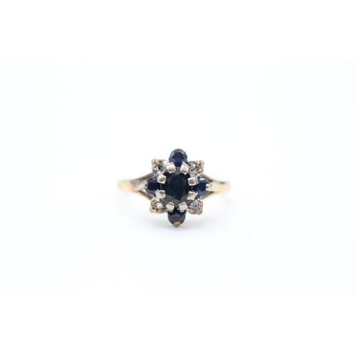 69 - 9ct gold diamond and sapphire star halo ring (3g) Size M