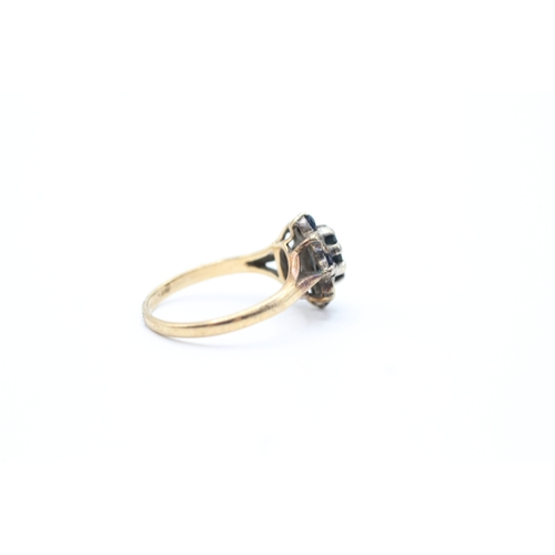 69 - 9ct gold diamond and sapphire star halo ring (3g) Size M