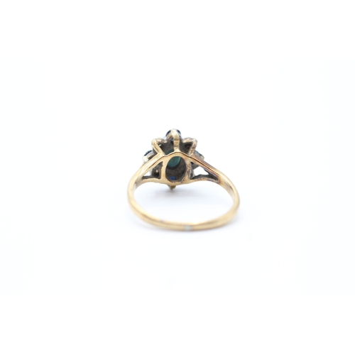 69 - 9ct gold diamond and sapphire star halo ring (3g) Size M