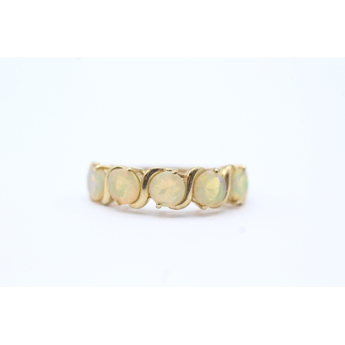 71 - 9ct gold opal row ring (2.7g) Size N 1/2