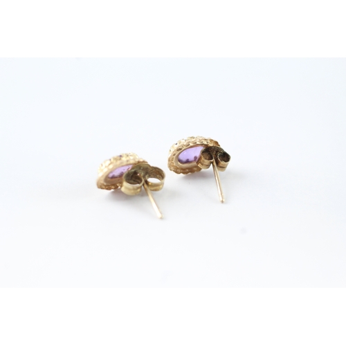 75 - 2x 9ct gold amethyst stud earrings (1.8g)