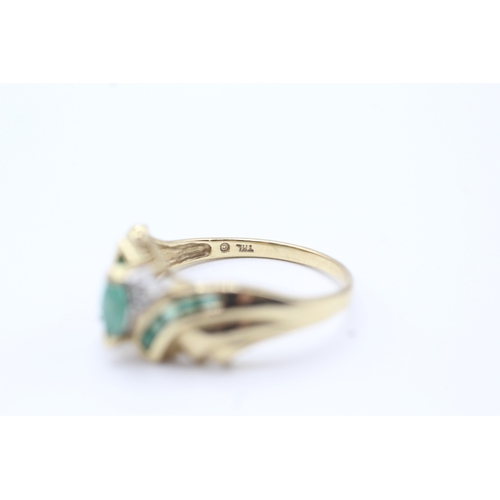 78 - 9ct gold emerald and diamond twist ring (3.1g) Size R