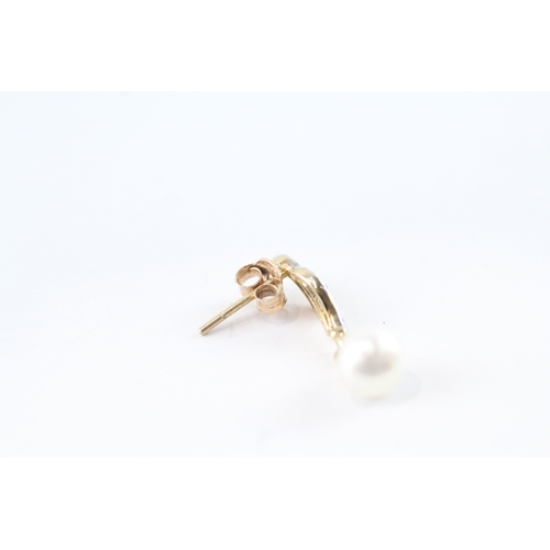 79 - 9ct gold pearl & diamond stud earrings (1.6g)