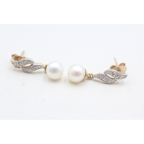 79 - 9ct gold pearl & diamond stud earrings (1.6g)