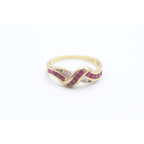 8 - 18ct gold diamond and ruby channel setting ring (2.6g) Size P