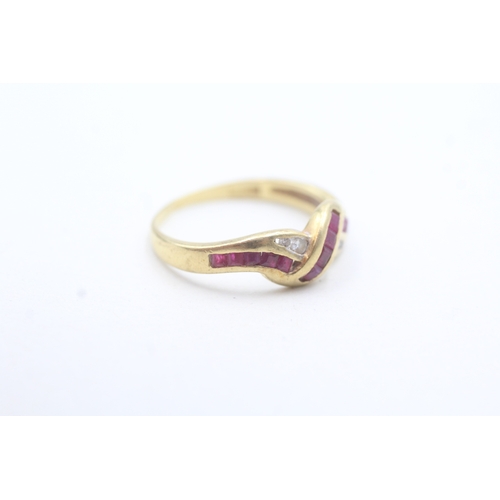 8 - 18ct gold diamond and ruby channel setting ring (2.6g) Size P