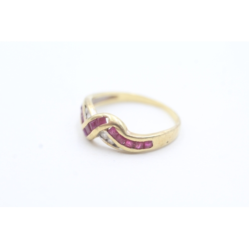 8 - 18ct gold diamond and ruby channel setting ring (2.6g) Size P