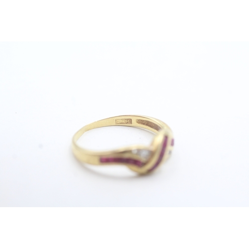 8 - 18ct gold diamond and ruby channel setting ring (2.6g) Size P