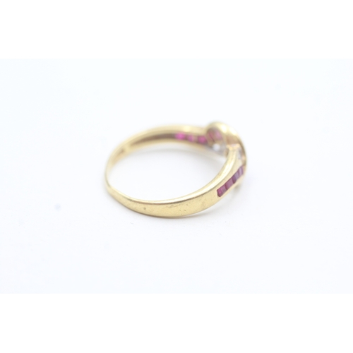 8 - 18ct gold diamond and ruby channel setting ring (2.6g) Size P