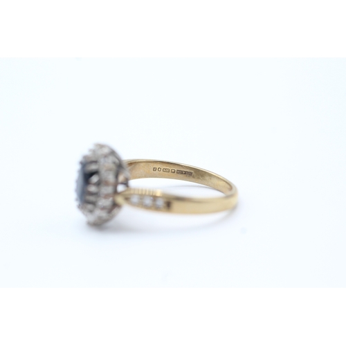 81 - 9ct gold diamond and sapphire halo ring (3.1g) Size J