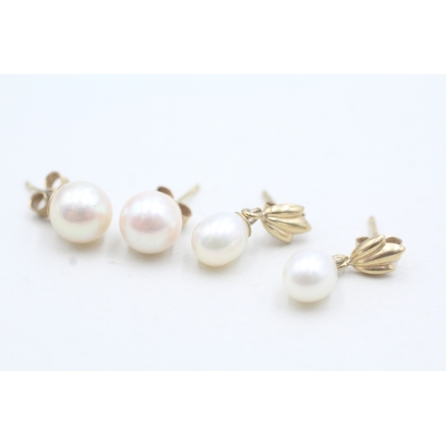 86 - 9ct gold x2 pearl stud earring set (2.3g)