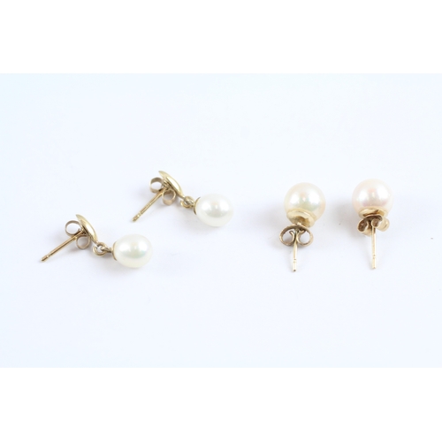 86 - 9ct gold x2 pearl stud earring set (2.3g)