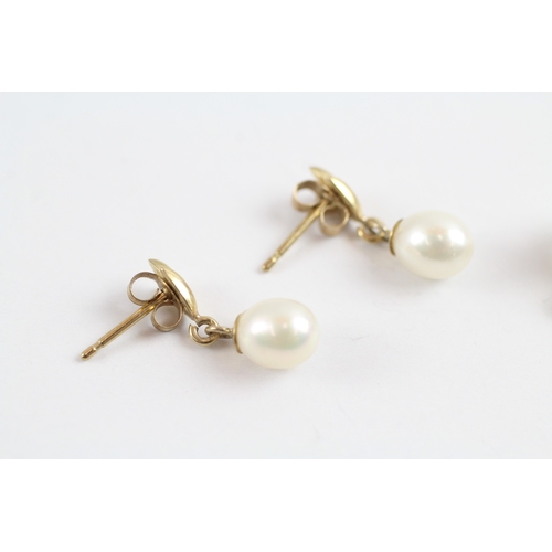 86 - 9ct gold x2 pearl stud earring set (2.3g)