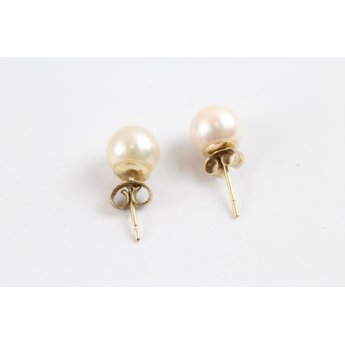 86 - 9ct gold x2 pearl stud earring set (2.3g)