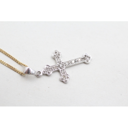 87 - 9ct white gold diamond set cross pendant and yellow gold chain (2.1g)