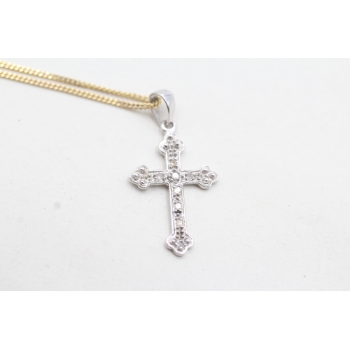 87 - 9ct white gold diamond set cross pendant and yellow gold chain (2.1g)