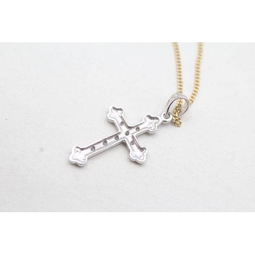 87 - 9ct white gold diamond set cross pendant and yellow gold chain (2.1g)