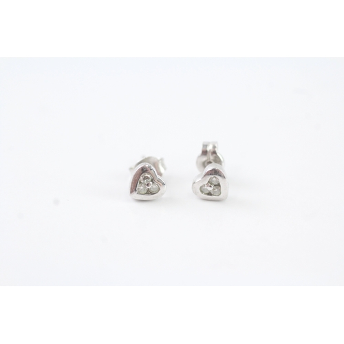 89 - 9ct white gold diamond heart shape stud earrings (0.8g)