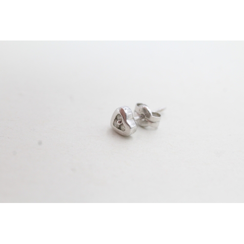 89 - 9ct white gold diamond heart shape stud earrings (0.8g)