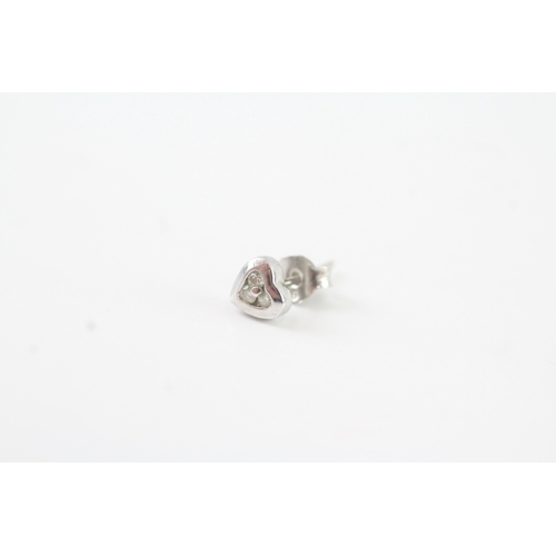 89 - 9ct white gold diamond heart shape stud earrings (0.8g)