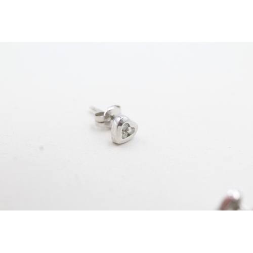 89 - 9ct white gold diamond heart shape stud earrings (0.8g)