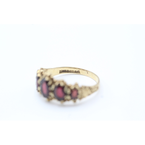 92 - 9ct gold garnet five stone ring (3.7g) Size R