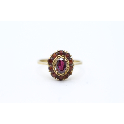 95 - 9ct gold garnet halo ring (2.2g) Size M