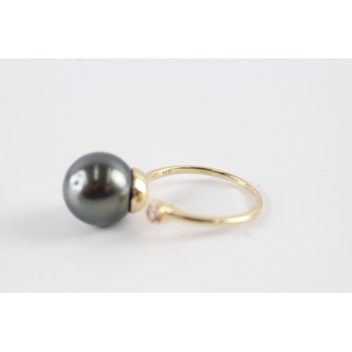 1 - 9ct gold cultured pearl and diamond open ring (4.5g) As seen  Size P