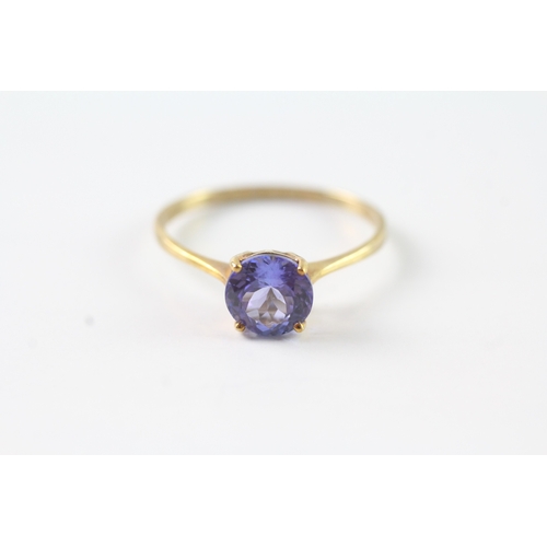 103 - 9ct gold blue gemstone solitaire ring (1.8g) Size V