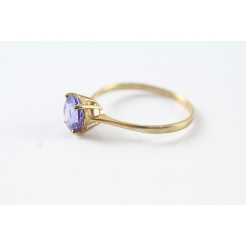 103 - 9ct gold blue gemstone solitaire ring (1.8g) Size V