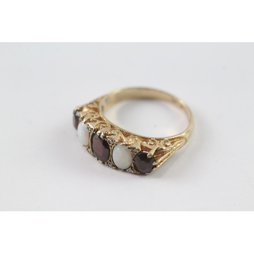 112 - 9ct gold vintage gypsy set opal, garnet and diamond dress ring (5.4g) Size Q