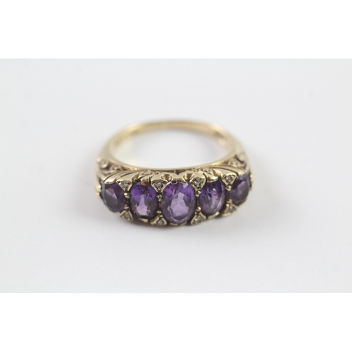 113 - 9ct gold vintage gypsy set amethyst and diamond dress ring (5.3g) Size N