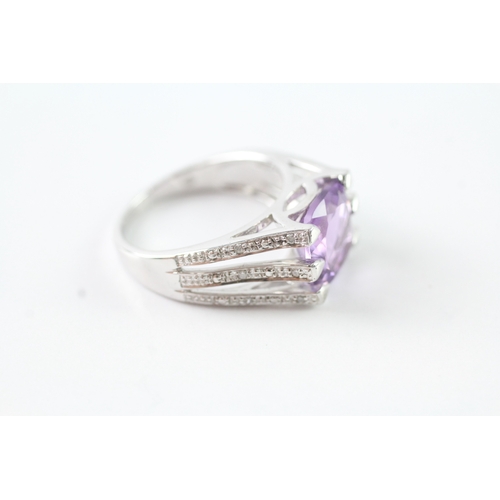 25 - 9ct white gold amethyst solitaire cocktail ring w/ diamond set shoulders (5.3g) Size N