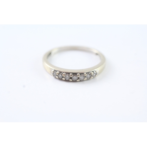 33 - 18ct gold diamond row set ring (2.4g) Size O