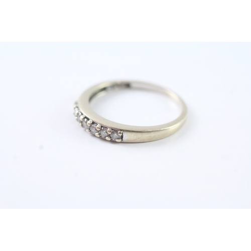 33 - 18ct gold diamond row set ring (2.4g) Size O