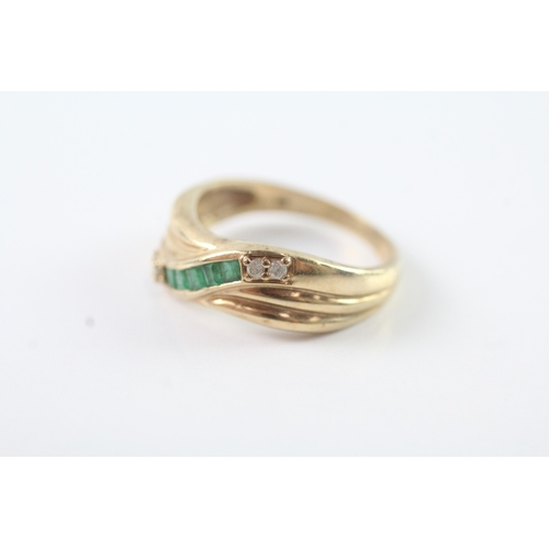 34 - 14ct gold emerald and diamond set band ring (3.6g) Size O