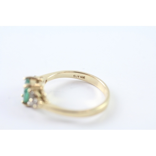 39 - 14ct gold emerald and white gemstone ring (3g) Size N