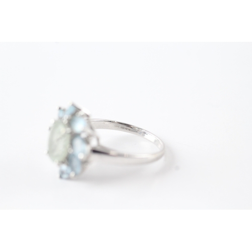 43 - 9ct gold diamond and blue gemstone ring (4.3g) Size R