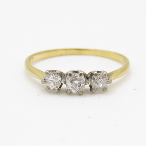 66 - 18ct gold three stone diamond ring (1.6g) Size K 1/2