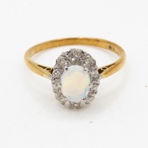 70 - 18ct gold opal and diamond halo set ring (3g) Size O 1/2