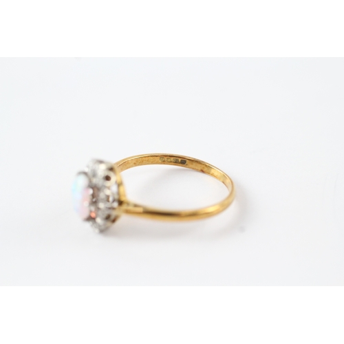 70 - 18ct gold opal and diamond halo set ring (3g) Size O 1/2