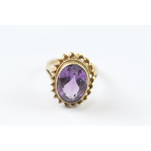 83 - 9ct gold amethyst cocktail ring (3.8g) Size K 1/2