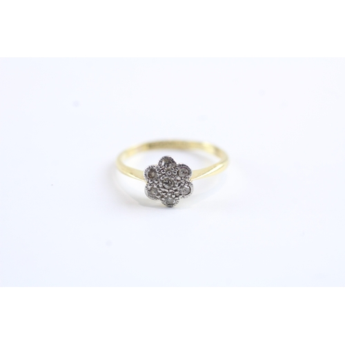 85 - 18ct gold diamond flower flush set ring Size J