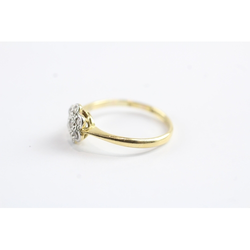 85 - 18ct gold diamond flower flush set ring Size J