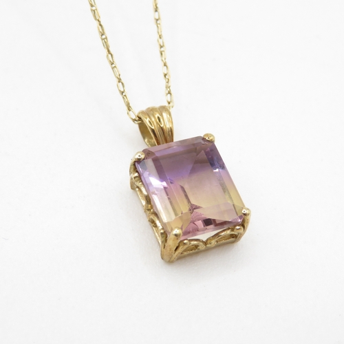 279 - 9ct gold emerald cut ametrine pendant necklace (2.9g)