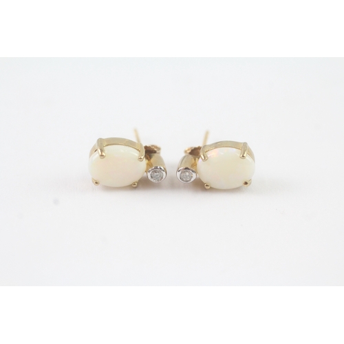 281 - 9ct gold opal & diamond stud earrings (2.4g)