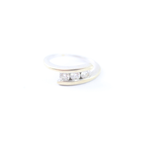 293 - 18ct gold trilogy diamond ring (3.7g) Size K 1/2